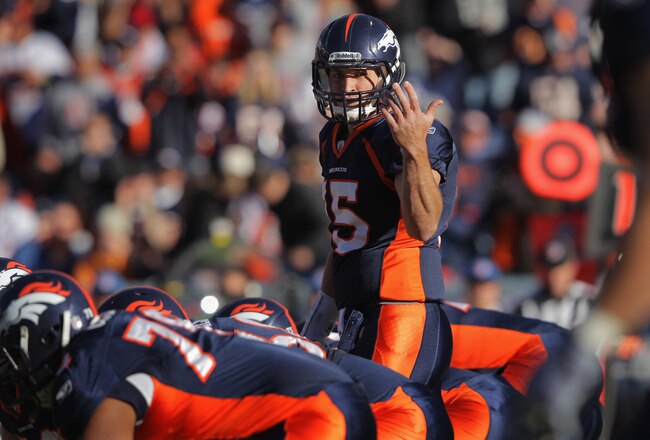 DENVER, CO - DECEMBER 11:  Quarterback Tim Tebow #15 of the Denver Broncos directs the offense against the Chicago Bears at Sports Authority Field at Mile High on December 11, 2011 in Denver, Colorado. The Broncos defeated the Bears 13-10 in overtime.  (Photo by Doug Pensinger/Getty Images)