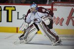 CALGARY, CANADA - OCTOBER 26: Jean-Sebastien Giguere #35 of the Colorado Avalanche skates against the Calgary Flames on October 26, 2011 at Scotiabank Saddledome in Calgary, Alberta, Canada. (Photo by Dale MacMillan/Getty Images)
