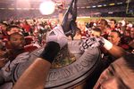 SAN DIEGO - DECEMBER 30:  Members of the University of Nebraska Cornhuskers hoist the trophy after defeating the University of Arizona Wildcats in the Pacific Life Holiday Bowl on December 30, 2009 at Qualcomm Stadium in San Diego, California. The Cornhuskers defeated the Wildcats 33-0. (Photo By Donald Miralle/Getty Images)