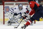 WASHINGTON, DC - DECEMBER 09: James Reimer #34 of the Toronto Maple Leafs keeps his eye on the puck as Alex Ovechkin #8 of the Washington Capitals bears down on him in the second period at the Verizon Center on December 9, 2011 in Washington, DC.  (Photo by Bruce Bennett/Getty Images)