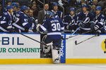 TAMPA, FL - NOVEMBER 22: Goalie Dwayne Roloson #30 of the Tampa Bay Lightning leaves the ice in the third period after giving up six goals against the Toronto Maple Leafs November 22, 2011 at St. Pete Times Forum in Tampa, Florida.Toronto won 7 - 1. (Photo by Al Messerschmidt/Getty Images)