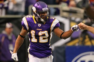 MINNEAPOLIS, MN - DECEMBER 4:  Percy Harvin #12 of the Minnesota Vikings celebrates a touchdown against the Denver Broncos at the Hubert H. Humphrey Metrodome on December 4, 2011 in Minneapolis, Minnesota.  (Photo by Adam Bettcher /Getty Images)