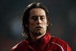 PODGORICA, MONTENEGRO - NOVEMBER 15:  Tomas Rosicky of Czech Republic warms up prior to the EURO 2012 Qualifier, Play Off Second Leg between Montenegro and the Czech Republic at the City Stadium on November 15, 2011 in Podgorica, Montenegro.  (Photo by Scott Heavey/Getty Images)