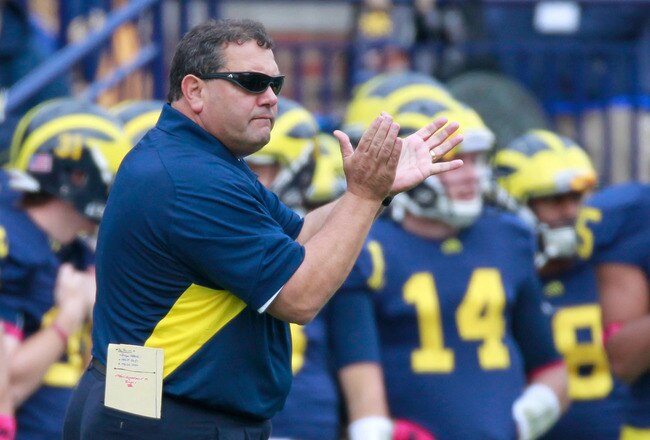 ANN ARBOR, MI - OCTOBER 29: Head coach Brady Hoke cheers on his team from the sideline while playing the Purdue Boilermakers at Michigan Stadium on October 29, 2011 in Ann Arbor, Michigan. Michigan won the game 36-14. (Photo by Gregory Shamus/Getty Images)