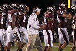 STARKVILLE, MS - NOVEMBER 12:  Coach Dan Mullens of the Mississippi State Bulldogs during a tieout with the team on November 12, 2011 at Davis Wade Stadium in Starkville, Mississippi. Alabama won 24-7. (Photo by Butch Dill/Getty Images)