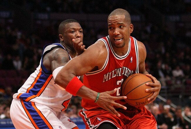 NEW YORK - DECEMBER 19: Michael Redd #22 of the Milwaukee Bucks drives to the basket against Nate Robinson #4 of the New York Knicks on December 19, 2008 at Madison Square Garden in New York City, New York. NOTE TO USER: User expressly acknowledges and agrees that, by downloading and or using this photograph, User is consenting to the terms and conditions of the Getty Images License Agreement.  (Photo by Nick Laham/Getty Images)