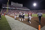 NORMAN, OK - OCTOBER 22:  Wide receiver Tramain Swindall #11 of the Texas Tech Red Raiders is congratulated by teammates after a touchdown reception in the second half against the Oklahoma Sooners October 22, 2011 at Gaylord Family-Oklahoma Memorial Stadium in Norman, Oklahoma. Texas Tech upset Oklahoma 41-38. (Photo by Brett Deering/Getty Images)