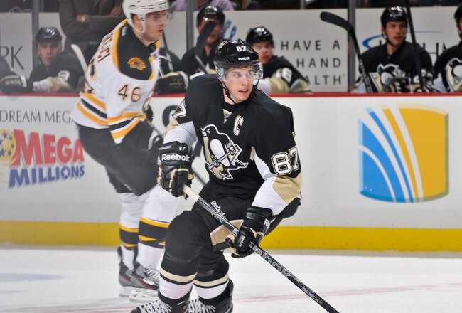 PITTSBURGH, PA - DECEMBER 5:  Sidney Crosby #87 of the Pittsburgh Penguins skates against the Boston Bruins on December 5, 2011 at CONSOL Energy Center in Pittsburgh, Pennsylvania.  (Photo by Jamie Sabau/Getty Images)