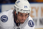 UNIONDALE, NY - DECEMBER 06:  Martin St. Louis #26 of the Tampa Bay Lightning skates against the New York Islanders at the Nassau Veterans Memorial Coliseum on December 6, 2011 in Uniondale, New York. The Islanders defeated the Lightning 5-1.  (Photo by Bruce Bennett/Getty Images)