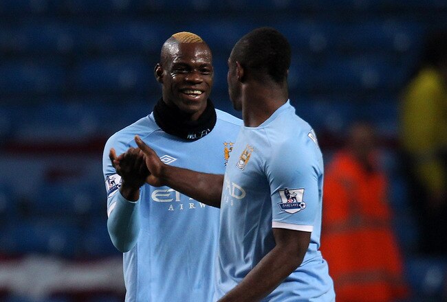 MANCHESTER, ENGLAND - MARCH 02:  Mario Balotelli of Manchester City celebrates scoring his team's second goal with team mate Micah Richards (R) during the FA Cup sponsored by E.On Fifth Round match between Manchester City and Aston Villa at the City of Manchester Stadium on March 2, 2011 in Manchester, England.  (Photo by Alex Livesey/Getty Images)