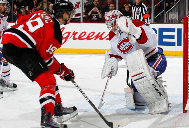 NEWARK, NJ - APRIL 02:  Goalie Carey Price #31 of the Montreal Canadians makes a save on a shot by Travis Zajac #19 of the New Jersey Devils during the second period of an NHL hockey game at the Prudential Center on April 2, 2011 in Newark, New Jersey. Montreal won 3-1. (Photo by Paul Bereswill/Getty Images)