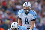 ORCHARD PARK, NY - DECEMBER 04:  Matt Hasselbeck #8 of the Tennessee Titans takes a snap behind  Eugene Amano #54 of the Tennessee Titans at Ralph Wilson Stadium on December 4, 2011 in Orchard Park, New York.  (Photo by Rick Stewart/Getty Images)