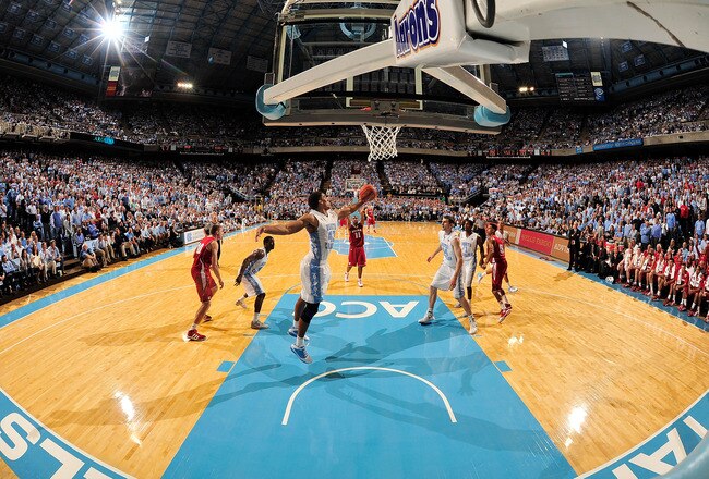 CHAPEL HILL, NC - NOVEMBER 30:  James Michael McAdoo #43 of the North Carolina Tar Heels rebounds a miss by Jordan Taylor #11 of the Wisconsin Badgers during play at the Dean Smith Center on November 30, 2011 in Chapel Hill, North Carolina. North Carolina won 60-57.  (Photo by Grant Halverson/Getty Images)