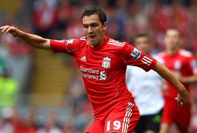 LIVERPOOL, ENGLAND - AUGUST 06:  Stewart Downing of Liverpool in action during the pre season friendly match between Liverpool and Valencia at Anfield on August 6, 2011 in Liverpool, England.  (Photo by Clive Brunskill/Getty Images)