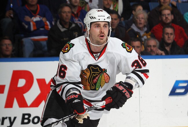 UNIONDALE, NY - DECEMBER 08:  Dave Bolland #36 of the Chicago Blackhawks skates against the New York Islanders at the Nassau Veterans Memorial Coliseum on December 8, 2011 in Uniondale, New York.  (Photo by Bruce Bennett/Getty Images)