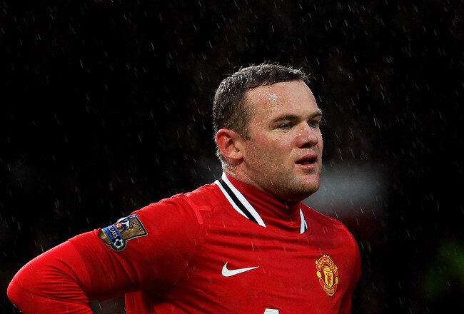 MANCHESTER, ENGLAND - DECEMBER 10:  Wayne Rooney of Manchester United looks on during the Barclays Premier League match between Manchester United and Wolverhampton Wanderers at Old Trafford on December 10, 2011 in Manchester, England.  (Photo by Alex Livesey/Getty Images)