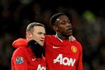 MANCHESTER, ENGLAND - DECEMBER 10:  (L-R) Wayne Rooney of Manchester United is congratulated by teammate Danny Welbeck after scoring his team's second goal during the Barclays Premier League match between Manchester United and Wolverhampton Wanderers at Old Trafford on December 10, 2011 in Manchester, England.  (Photo by Alex Livesey/Getty Images)