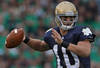 SOUTH BEND, IN - SEPTEMBER 25: Dayne Crist #10 of the Notre Dame Fighting Irish passes the ball against the Stanford Cardinal at Notre Dame Stadium on September 25, 2010 in South Bend, Indiana. Stanford defated Notre Dame 37-14. (Photo by Jonathan Daniel/Getty Images)