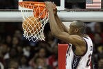NEWARK, NJ - APRIL 03:  Travis Outlaw #21 of the New Jersey Nets dunks against the Miami Heat at the Prudential Center on April 3, 2011 in Newark, New Jersey.The Heat defeated the Nets 108-94.NOTE TO USER: User expressly acknowledges and agrees that, by downloading and/or using this Photograph, user is consenting to the terms and conditions of the Getty Images License Agreement.  (Photo by Jim McIsaac/Getty Images)