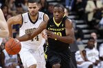 NASHVILLE, TN - NOVEMBER 11: Johnathan Loyd #10 of the Oregon Ducks leads a fast break ahead of Jeffery Taylor #44 of the Vanderbilt Commodores during their game at Memorial Gymansium on November 11, 2011 in Nashville, Tennessee. Vanderbilt defeated Oregon 78-64.(Photo by Joe Robbins/Getty Images)