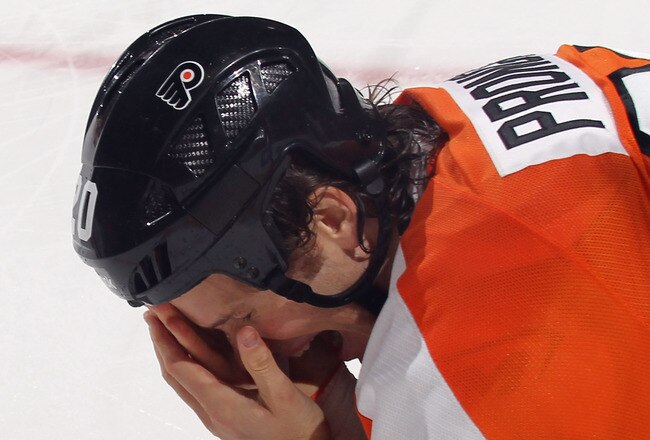 PHILADELPHIA, PA - OCTOBER 24:  Chris Pronger #20 of the Philadelphia Flyers falls to the ice after being hit in the face by a stick during the game against the Toronto Maple Leafs at Wells Fargo Center on October 24, 2011 in Philadelphia, Pennsylvania. The Flyers defeated the Leafs 4-2. (Photo by Bruce Bennett/Getty Images)
