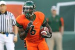 MIAMI - NOVEMBER 20:  Lamar Miller #6 of the Miami Hurricanes runs for a touchdown during a game against the Virginia Tech Hokies at Sun Life Stadium on November 20, 2010 in Miami, Florida.  (Photo by Mike Ehrmann/Getty Images)