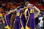 ATLANTA, GA - MARCH 10:  Andre Stringer #10 of the LSU Tigers and his teammmates huddle during their game against the Vanderbilt Commodores in the first round of the SEC Men's Basketball Tournament at the Georgia Dome on March 10, 2011 in Atlanta, Georgia.  (Photo by Kevin C. Cox/Getty Images)