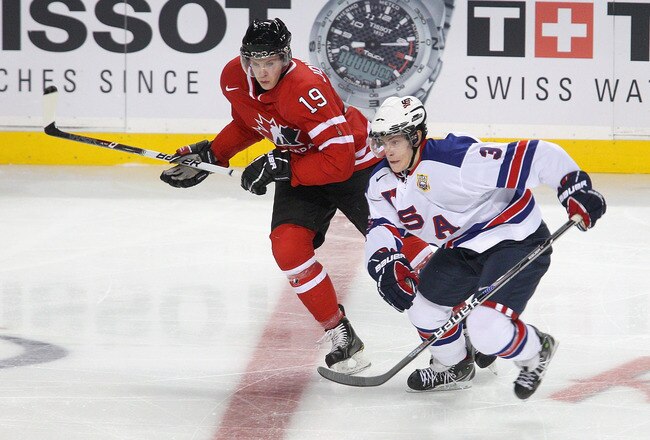 BUFFALO, NY - JANUARY 03: Charlie Coyle #3 of the United States skates against Ryan Johansen #19 of Canada during the 2011 IIHF World U20 Championship Semi Final game between United States and Canada on January 3, 2011 in Buffalo, New York. Canada won 4-1 and faces Russia in the gold medal game.  (Photo by Rick Stewart/Getty Images)