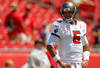 TAMPA, FL - SEPTEMBER 11:  Josh Freeman #5 of the Tampa Bay Buccaneers warms up during season opener against the Detroit Lions at Raymond James Stadium on September 11, 2011 in Tampa, Florida.  (Photo by Mike Ehrmann/Getty Images)