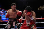 NEW YORK - OCTOBER 22:  Nonito Donaire of the Philippines connects with a left to Omar Narvaez of Argentina in the WBC, WBO World Bantamweight Titles bout at Madison Square Garden on October 22, 2011 in New York City.  (Photo by Chris Trotman/Getty Images)