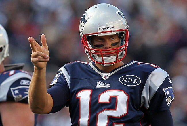 FOXBORO, MA -  SEPTEMBER 18:  Tom Brady #12 of the New England Patriots gestures during a game with the San Diego Chargers at Gillette Stadium on September 18, 2011 in Foxboro, Massachusetts. (Photo by Jim Rogash/Getty Images)