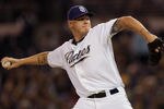 SAN DIEGO, CA - SEPTEMBER 26: Starting pitcher Matt Latos #38 of the San Diego Padres throws the ball during the first inning of the game against the Chicago Cubs at Petco Park on September 26, 2011 in San Diego, California. (Photo by Kent C. Horner/Getty Images)