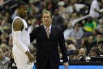WASHINGTON, DC - FEBRUARY 26: Head coach Flip Saunders (R) talks with John Wall #2 of the Washington Wizards against the Dallas Mavericks at the Verizon Center on February 26, 2011 in Washington, DC. NOTE TO USER: User expressly acknowledges and agrees that, by downloading and or using this Photograph, user is consenting to the terms and conditions of the Getty Images License Agreement.  (Photo by Rob Carr/Getty Images)