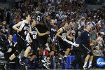 NEW ORLEANS, LA - MARCH 26:  The Butler Bulldogs celebrate after defeating the Florida Gators 74 to 71 in overtime during the Southeast regional final of the 2011 NCAA men's basketball tournament at New Orleans Arena on March 26, 2011 in New Orleans, Louisiana.  (Photo by Streeter Lecka/Getty Images)