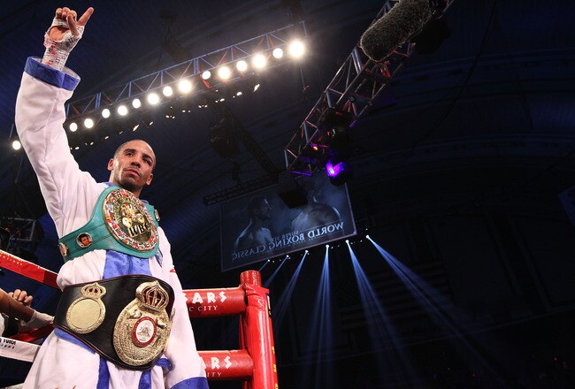ATLANTIC CITY, NJ - DECEMBER 17:  Andre Ward celebrates defeating Carl Froch of England during their WBA/WBC Super Middleweight Championship bout at Boardwalk Hall on December 17, 2011 in Atlantic City, New Jersey.  (Photo by Nick Laham/Getty Images)