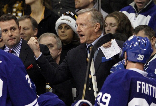 BOSTON, MA - DECEMBER 03:  Head coach Ron Wilson of the Toronto Maple Leafs talks with his players during a time out in the third period against the Boston Bruins on December 3, 2011 at TD Garden in Boston, Massachusetts. The Boston Bruins defeated the Toronto Maple Leafs 4-1.  (Photo by Elsa/Getty Images)
