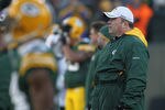 GREEN BAY, WI - DECEMBER 11: Head coach Mike McCarthy of the Green Bay Packers watches his team during warm-ups before a game against the Oakland Raiders at Lambeau Field on December 11, 2011 in Green Bay, Wisconsin. (Photo by Jonathan Daniel/Getty Images)