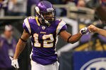 MINNEAPOLIS, MN - DECEMBER 4:  Percy Harvin #12 of the Minnesota Vikings celebrates a touchdown against the Denver Broncos at the Hubert H. Humphrey Metrodome on December 4, 2011 in Minneapolis, Minnesota.  (Photo by Adam Bettcher /Getty Images)