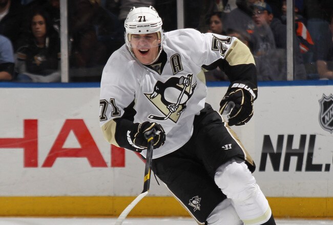 UNIONDALE, NY - DECEMBER 10:  Evgeni Malkin #71 of the Pittsburgh Penguin skates against the New York Islanders at the Nassau Veterans Memorial Coliseum on December 10, 2011 in Uniondale, New York.  (Photo by Bruce Bennett/Getty Images)