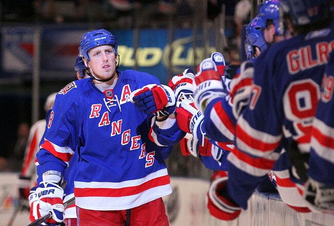 NEW YORK, NY - APRIL 17:  Marc Staal #18 of the New York Rangers celebrates with teammates on the bench after Vaclav Prospal #20 scored a goal in the third period in Game Three of the Eastern Conference Quarterfinals during the 2011 NHL Stanley Cup Playoffs at Madison Square Garden on April 17, 2011 in New York City.  (Photo by Bruce Bennett/Getty Images)