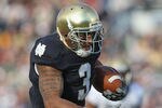 SOUTH BEND, IN - OCTOBER 29: Michael Floyd#3 of the Notre Dame Fighting Irish runs for a touchdown after catching a pass against the Navy Midshipmen at Notre Dame Stadium on October 29, 2011 in South Bend, Indiana. Notre Dame defeated Navy 56-14. (Photo by Jonathan Daniel/Getty Images)