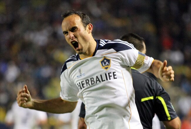 CARSON, CA - NOVEMBER 20:  Landon Donovan #10 of the Los Angeles Galaxy jubilates after scoring the eventual game-winning goal against the Houston Dynamo in the second half during 2011 MLS Cup at The Home Depot Center on November 20, 2011 in Carson, California. The Galaxy defeated the Dynamo 1-0 to win the MLS Cup.  (Photo by Victor Decolongon/Getty Images)