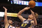 DALLAS, TX - FEBRUARY 23:  Forward Anrei Kirilenko #47 of the Utah Jazz is fouled by Jason Kidd #2 of the Dallas Mavericks at American Airlines Center on February 23, 2011 in Dallas, Texas.  NOTE TO USER: User expressly acknowledges and agrees that, by downloading and or using this photograph, User is consenting to the terms and conditions of the Getty Images License Agreement.  (Photo by Ronald Martinez/Getty Images)