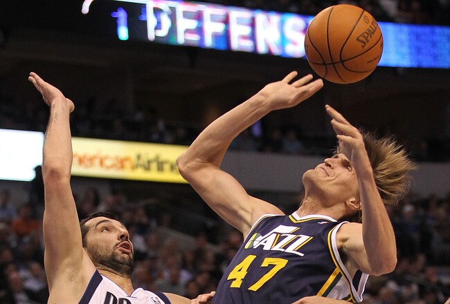 DALLAS, TX - FEBRUARY 23:  Forward Anrei Kirilenko #47 of the Utah Jazz is fouled by Jason Kidd #2 of the Dallas Mavericks at American Airlines Center on February 23, 2011 in Dallas, Texas.  NOTE TO USER: User expressly acknowledges and agrees that, by downloading and or using this photograph, User is consenting to the terms and conditions of the Getty Images License Agreement.  (Photo by Ronald Martinez/Getty Images)