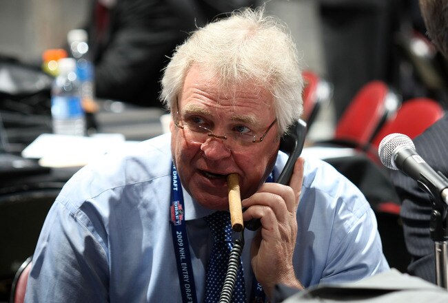 MONTREAL, QC - JUNE 27:  General Manager and President Glen Sather of the New York Rangers works the phones during the 2009 NHL Entry Draft at the Bell Centre on June 27, 2009 in Montreal, Quebec, Canada.  (Photo by Bruce Bennett/Getty Images)