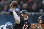 CHICAGO, IL - DECEMBER 18:  Caleb Hanie #12 of the Chicago Bears throws a pass against the Seattle Seahawks at Soldier Field on December18, 2011 in Chicago, Illinois. The Seahawks defeated the Bears 38-14.  (Photo by Jonathan Daniel/Getty Images)