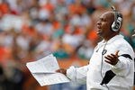 MIAMI GARDENS, FL - DECEMBER 04:  Oakland Raiders head coach Hue Jackson looks on during a game against the Miami Dolphins at Sun Life Stadium on December 4, 2011 in Miami Gardens, Florida.  (Photo by Mike Ehrmann/Getty Images)