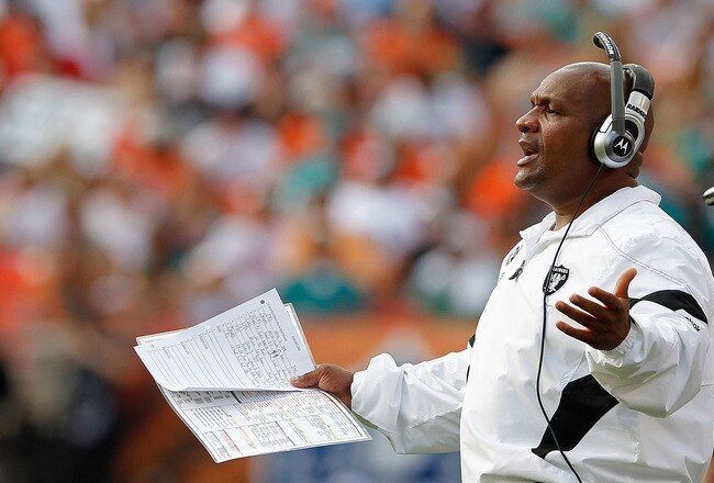MIAMI GARDENS, FL - DECEMBER 04:  Oakland Raiders head coach Hue Jackson looks on during a game against the Miami Dolphins at Sun Life Stadium on December 4, 2011 in Miami Gardens, Florida.  (Photo by Mike Ehrmann/Getty Images)