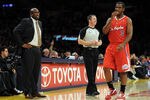 LOS ANGELES, CA - DECEMBER 19:  Head Coach Mike Brown of the Los Angeles Lakers talks to Chris Paul #3 of the Los Angeles Clippers during a 114-95 Clipper win at Staples Center on December 19, 2011 in Los Angeles, California.  (Photo by Harry How/Getty Images)