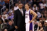 PHOENIX, AZ - APRIL 13:  Head coach Alvin Gentry and Steve Nash #13 of the Phoenix Suns talk during the NBA game against the San Antonio Spurs at US Airways Center on April 13, 2011 in Phoenix, Arizona.  NOTE TO USER: User expressly acknowledges and agrees that, by downloading and or using this photograph, User is consenting to the terms and conditions of the Getty Images License Agreement.  (Photo by Christian Petersen/Getty Images)